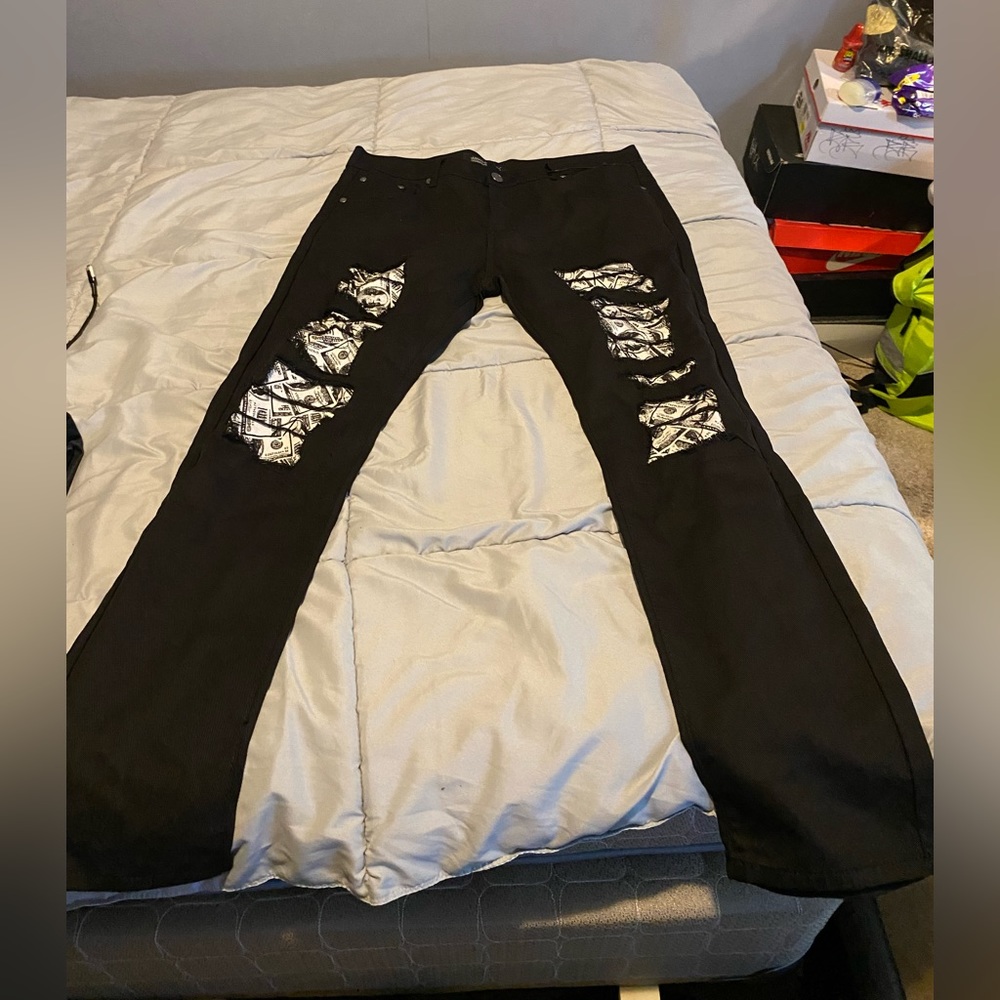 Black denim pants ripped jeans